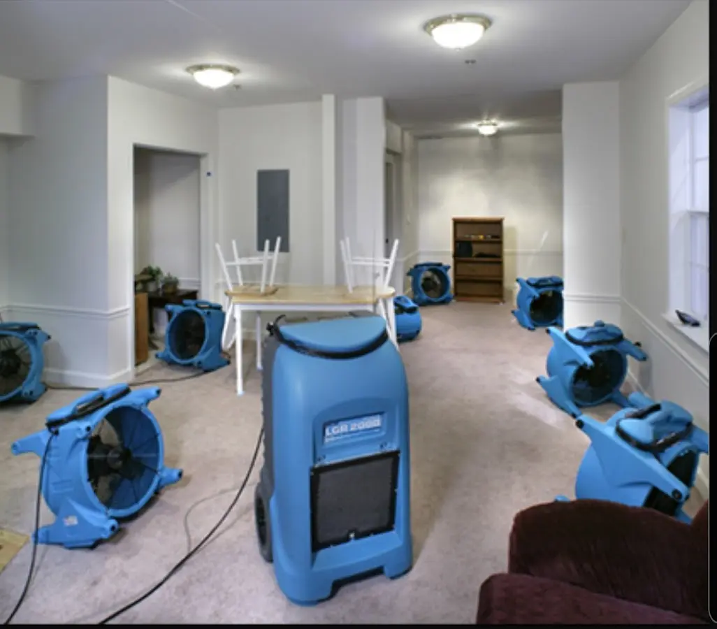 Air movers and dehumidifier setup for Water Damage Restoration in Westtown